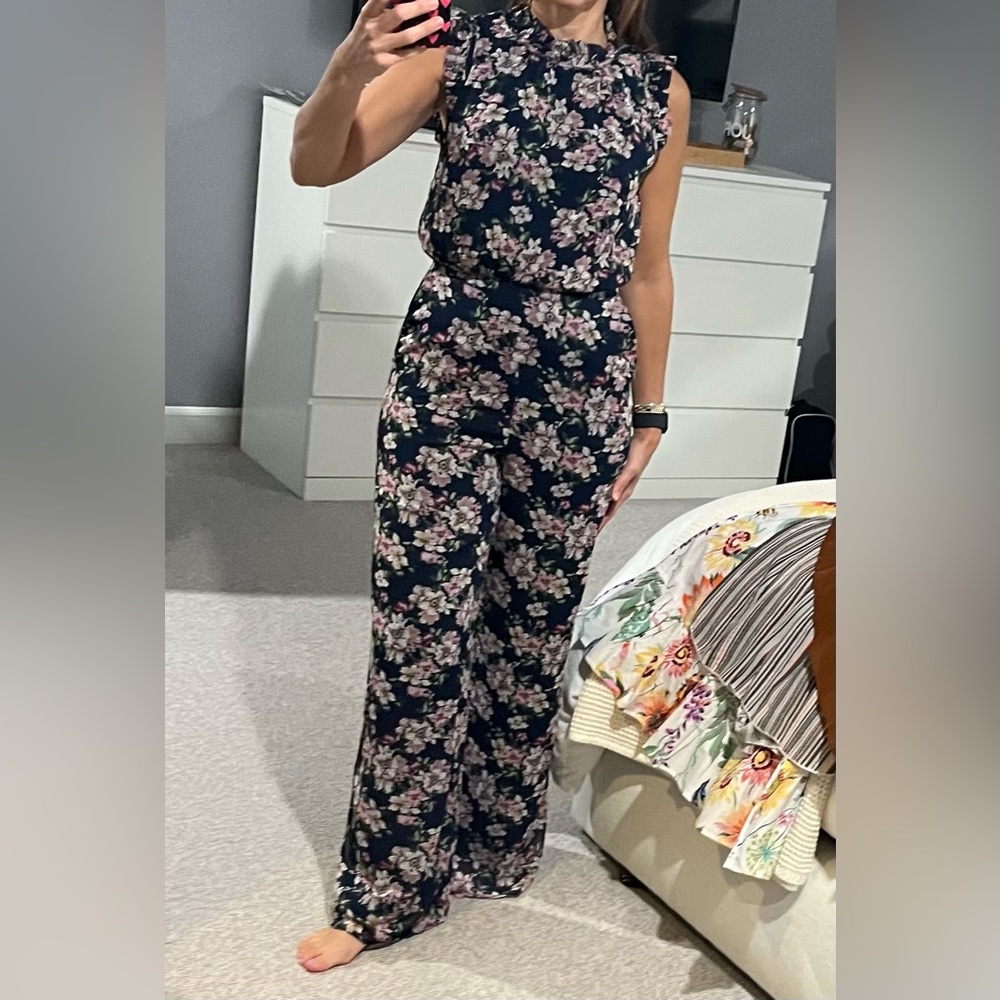 Navy Floral Chiffon jumpsuit with ruffled sleeves and neck - size small